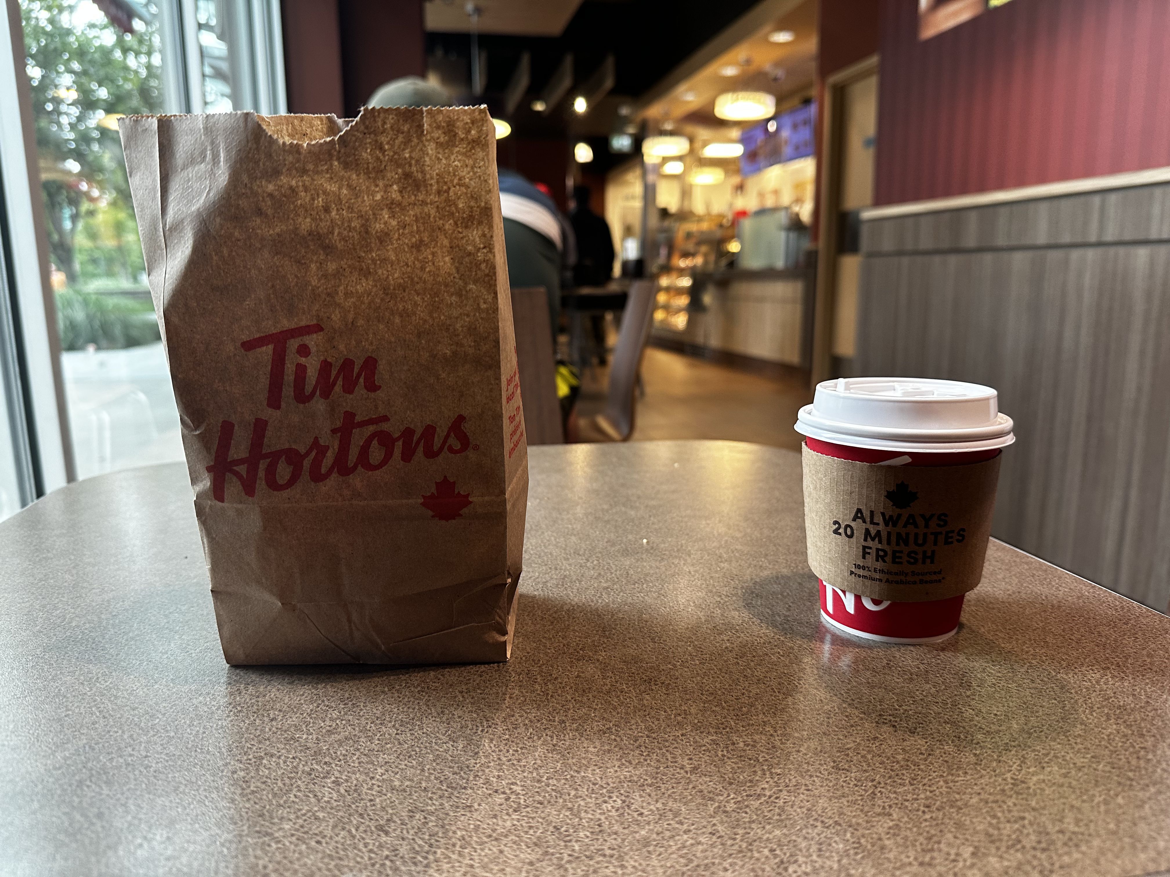 A Tim Hortons bag and cup