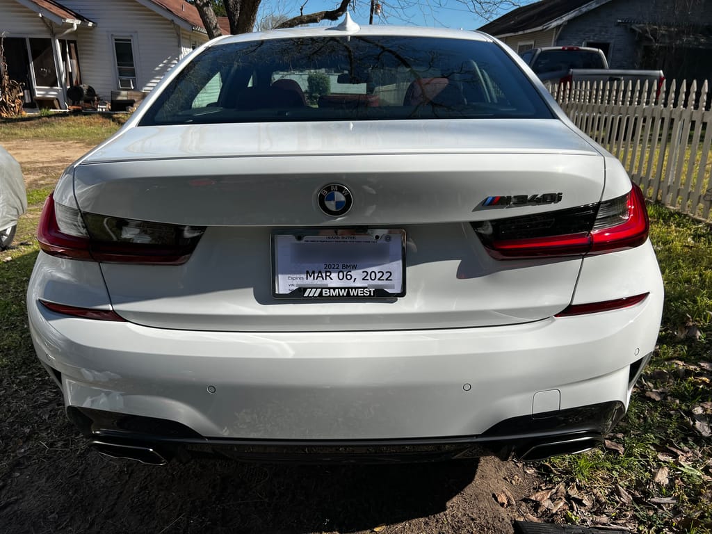 The rear end of my BMW M340i, with the M340i badge